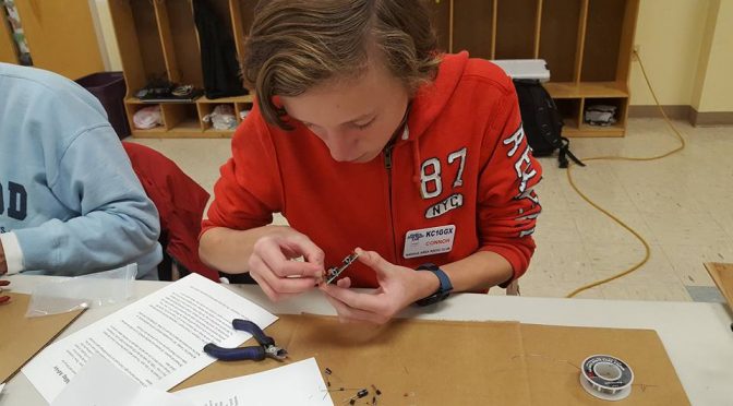 Connor Finchum, KC1GGX building his Pixie Kit