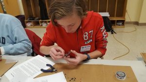 Connor at Tech Night - Building his Pixie Kit