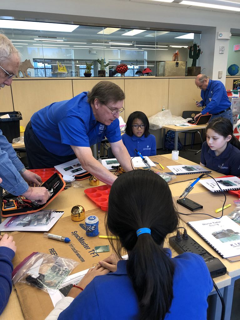 Fred AB1OC Mentoring Students at World Academy Kit Build
