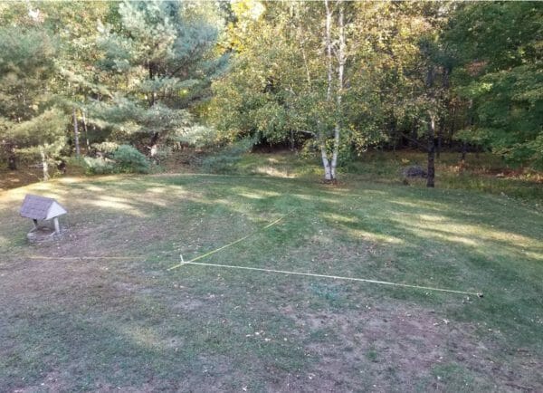 Measure the site to locate the best place to install the mast.
